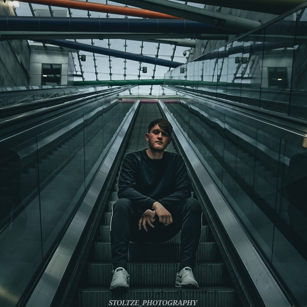 Kevin Meißner sitting on an elevator